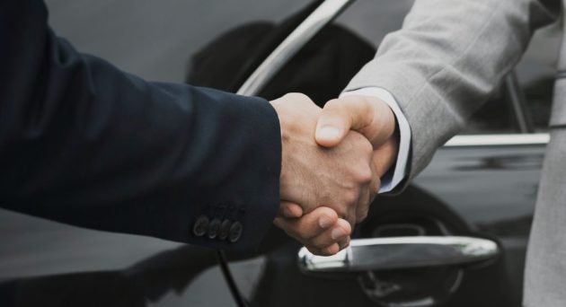 businessmen-greeting-by-shaking-hands